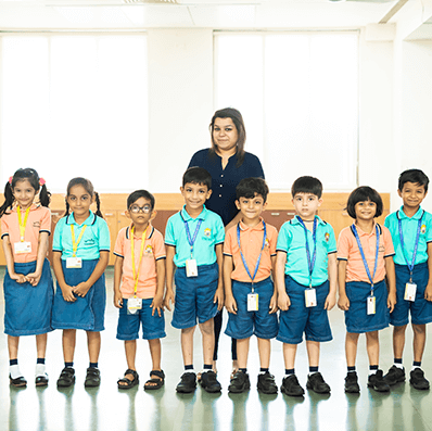 Preschool in Oshiwara – Kids and Teacher